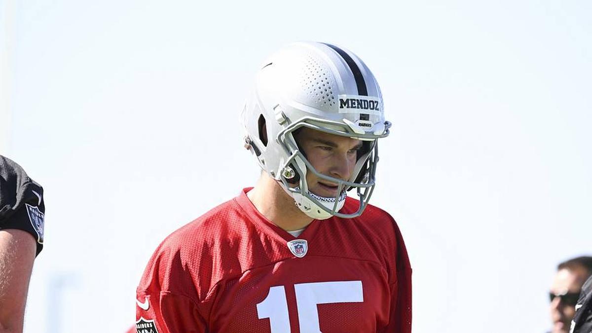  May 20, 2026; Henderson, NV, USA; Las Vegas Raiders quarterback Fernando Mendoza (15) stretches during organized team activities at Intermountain Health Performance Center. Mandatory Credit: Candice Ward-Imagn Images | Candice Ward-Imagn Images 