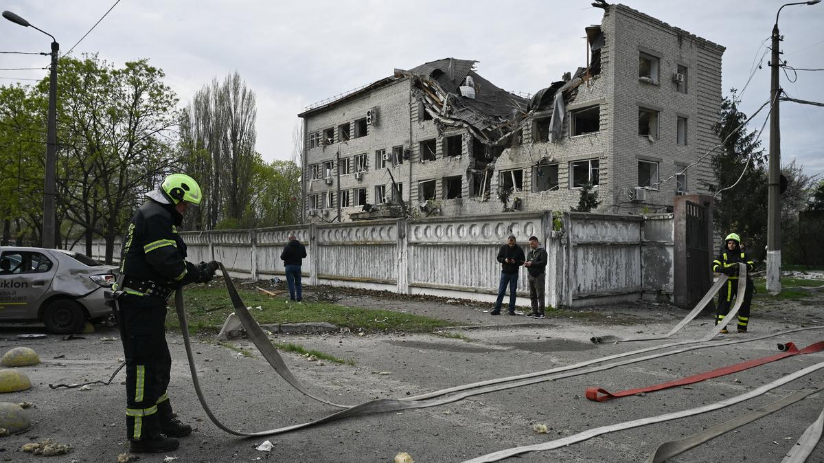 Firefighters work at a site following a Russian strike in Kyiv on April 16, 2026, amid the Russian invasion of Ukraine. (Genya Savilov/AFP/Getty Images/TNS)