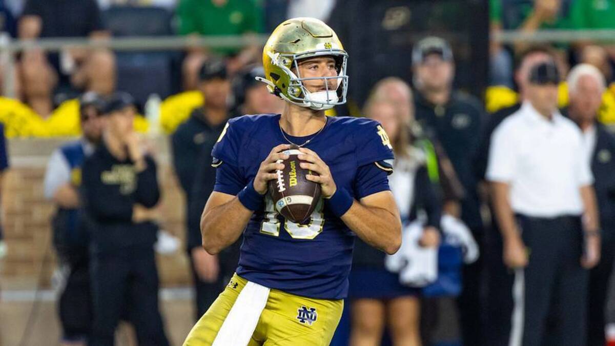  Sep 20, 2025; South Bend, Indiana, USA; A Notre Dame Fighting Irish quarterback CJ Carr (13) looks to pass against the Purdue Boilermakers during the second half at Notre Dame Stadium. | IMAGN IMAGES via Reuters Connect 
