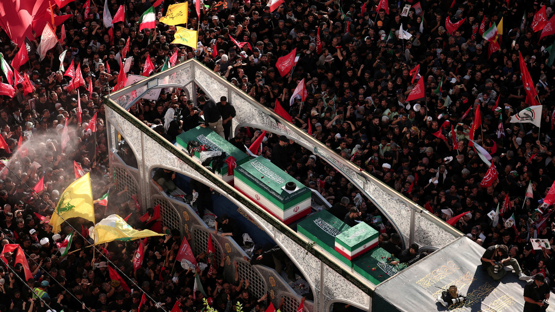 Iran says it hits US military targets in Gulf, lays slain leader to rest 