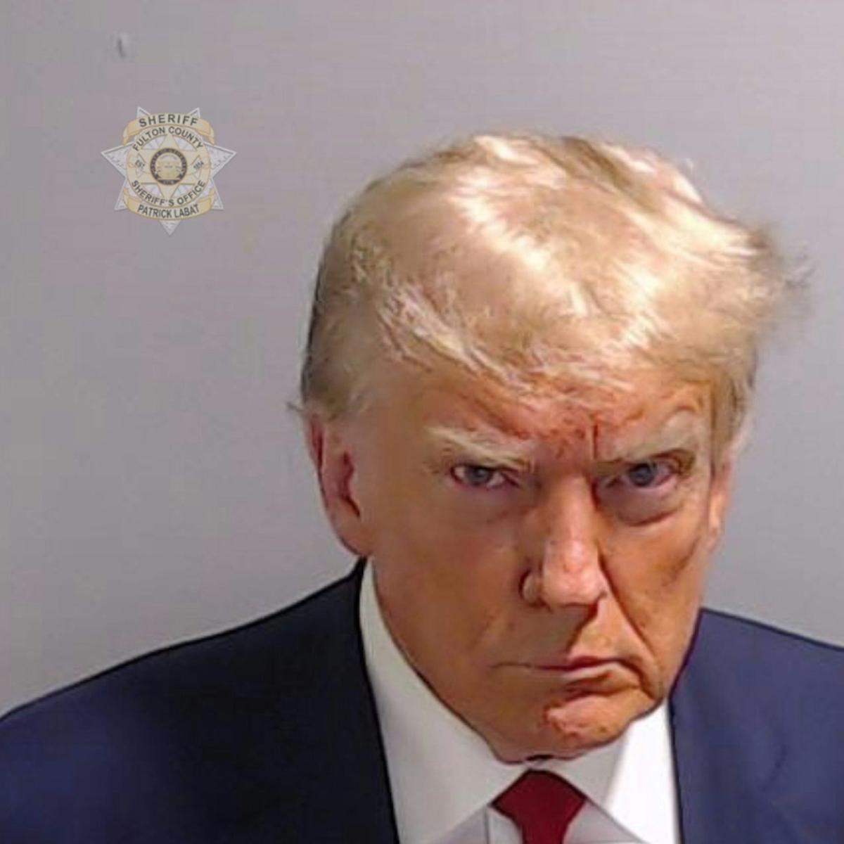  In this handout provided by the Fulton County Sheriff's Office, former U.S. President Donald Trump poses for his booking photo at the Fulton County Jail on Aug. 24, 2023, in Atlanta, Ga. Fulton County Sheriff's Office via Getty Images 