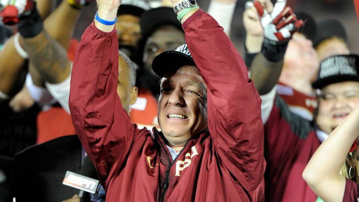  Jan 6, 2014; Pasadena, CA, USA; Florida State Seminoles head coach Jimbo Fisher (middle) celebrates with the Coaches Trophy after the 2014 BCS National Championship game against the Auburn Tigers at the Rose Bowl. Mandatory Credit: Kirby Lee-USA TODAY Sports | IMAGN IMAGES via Reuters Connect 