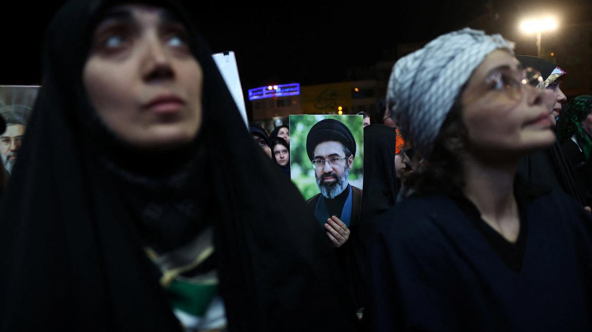 A woman holds an image of Iran's Supreme Leader Mojtaba Khamenei, during a rally in Tehran, Iran, June 1, 2026. Majid Asgaripour/WANA (West Asia News Agency) via REUTERS
