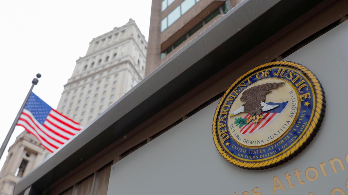 The seal of the United States Department of Justice is seen on the building exterior of the United States Attorney's Office of the Southern District of New York in Manhattan, New York City, U.S., August 17, 2020. REUTERS/Andrew Kelly