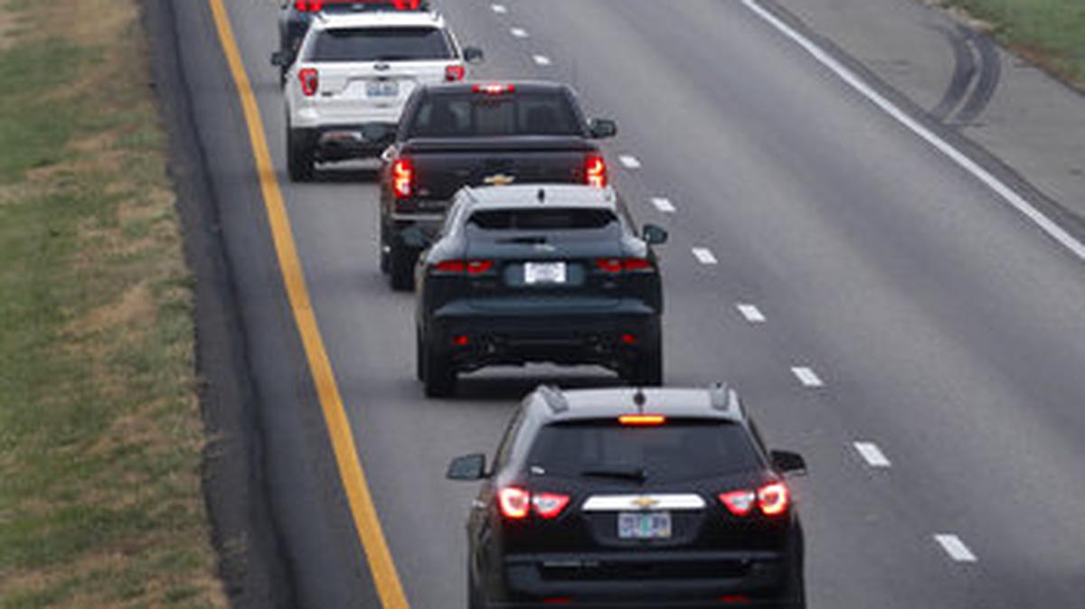 In this photo made Wednesday, Nov. 1, 2017, a driver stays in the passing lane as traffic accumulates behind along I-70 in Montgomery County, Mo. Many states have laws against driving in the left lane except for passing or turning left, which are often ignored by drivers, leading to annoying and dangerous bottlenecks that some experts say are as bad as driving too fast because people get trapped behind and become frustrated prompting some to drive more aggressively.