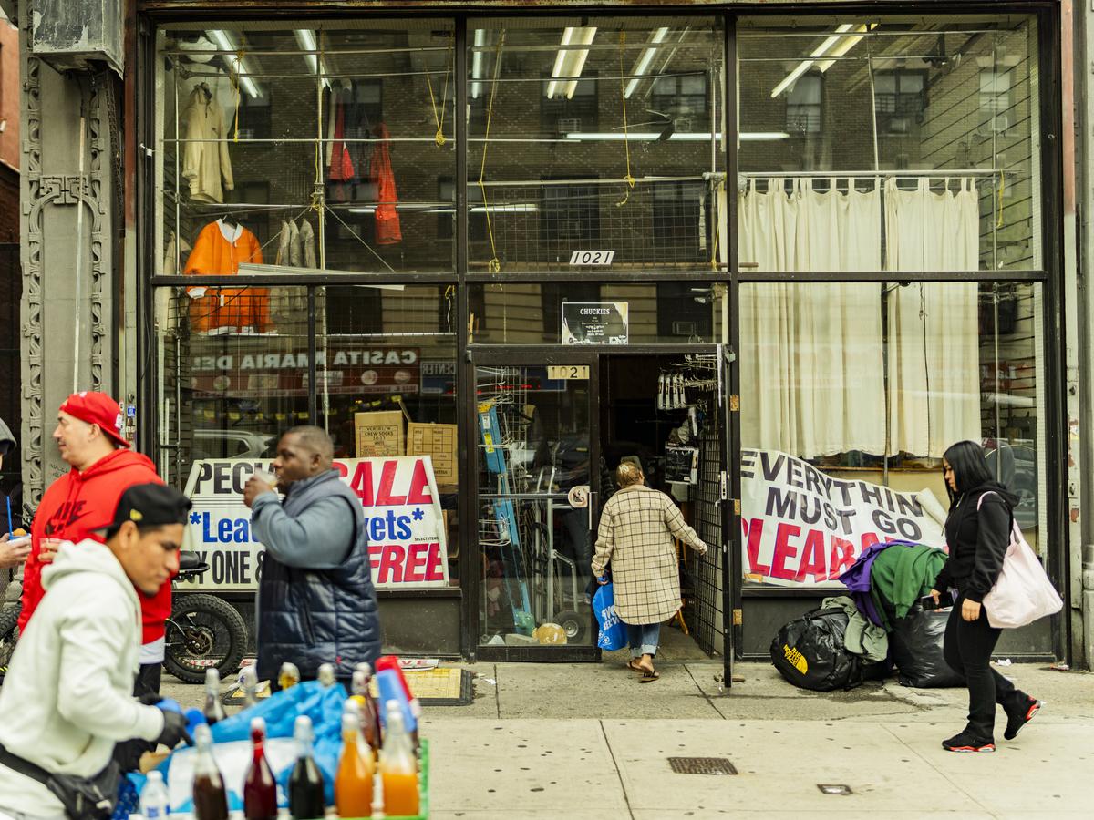 Signs mark the closing of a South Bronx streetwear emporium after 60 years, in New York, April 30, 2026. The name of the store was H&R Hosiery, though nobody called it that. But it shaped street fashion, until the rent rose to $8,000 a month. (Elias WIlliams/The New York Times)