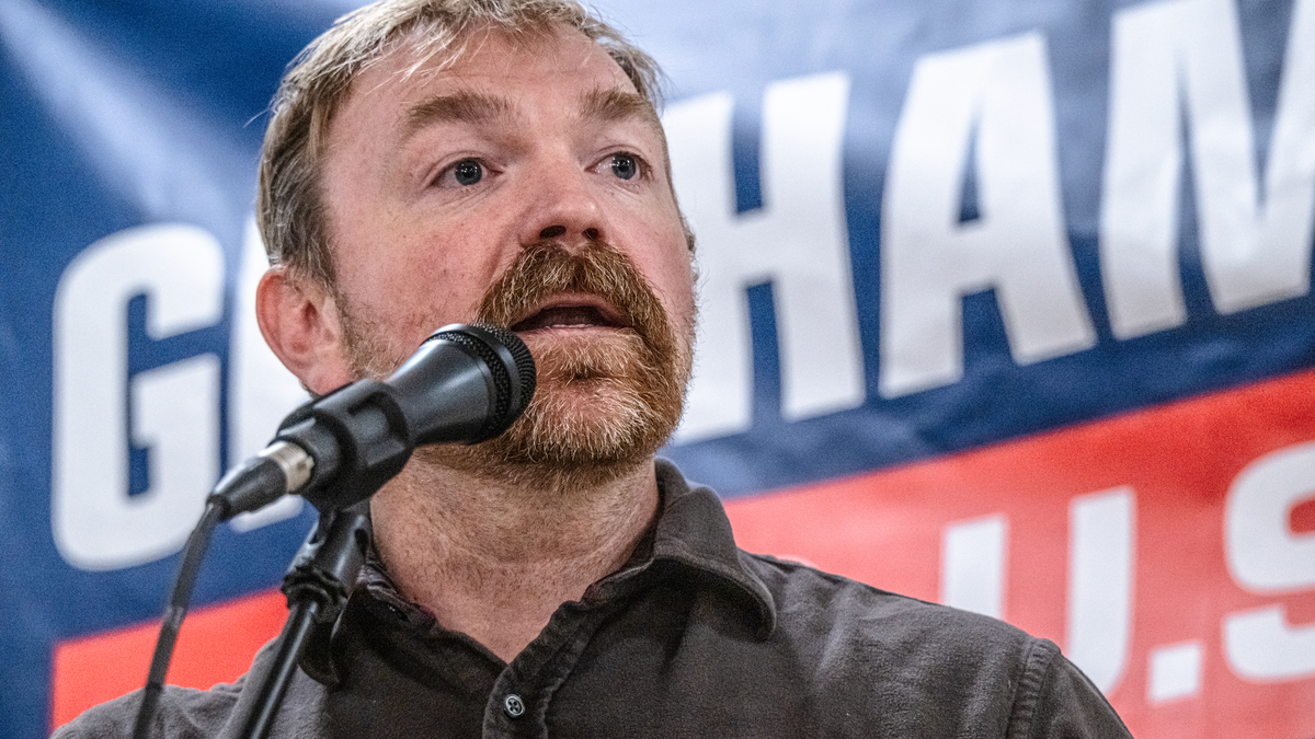 Then-Democratic U.S. Senate candidate Graham Platner speaks to voters at a town hall at the Elks Lodge 188 on June 7, 2026, in Portland, Maine. His replacement will face Republican incumbent Susan Collins for Maine's U.S. Senate seat in the general election. (Laura Brett/Getty Images/TNS)