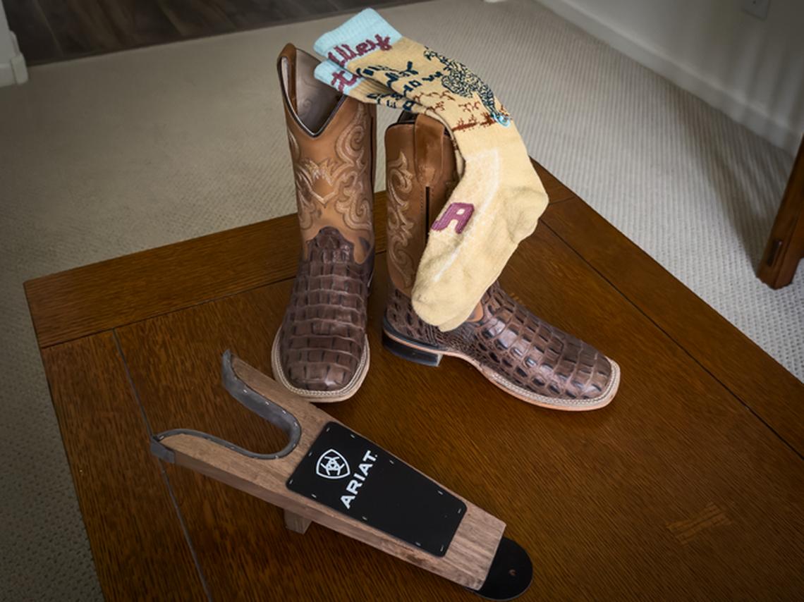 Boots, long socks, and boot jack for removing boots. Photo credit: Julie Diebolt Price