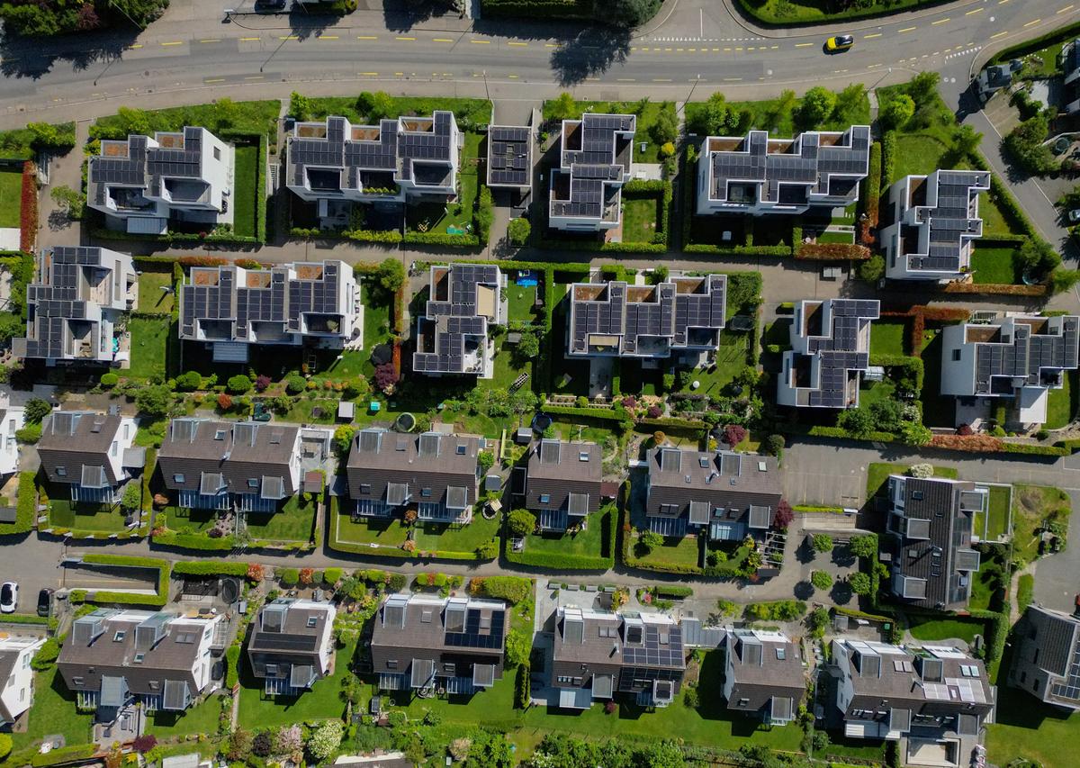 A drone view shows newly constructed dwellings in the village of Knonau, ahead of a June 14 vote on a plan backed by the right-wing Swiss People's Party (SVP) to curb population growth to 10 million inhabitants, in Knonau, Switzerland, May 21, 2026. REUTERS/Cecile Mantovani