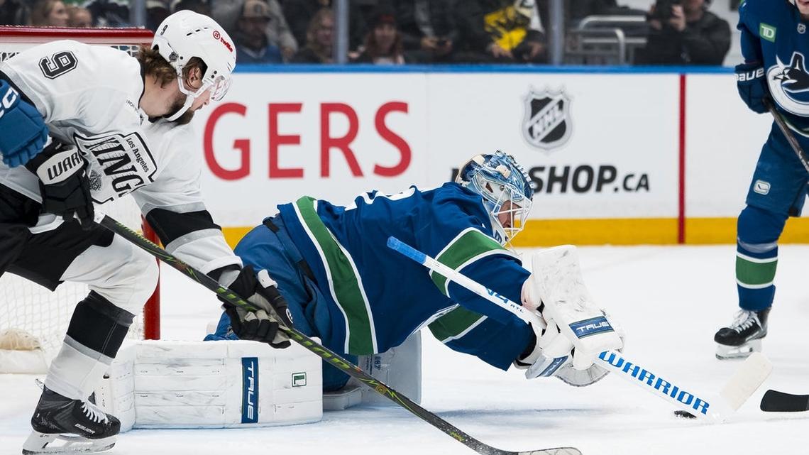 Jake DeBrusk's 2nd goal lifts Canucks past Kings in OT 