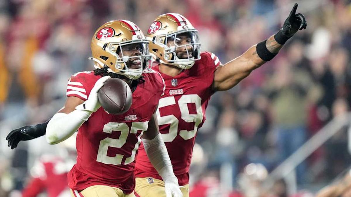  Nov 24, 2025; Santa Clara, California, USA; San Francisco 49ers safety Ji'Ayir Brown (27) reacts after an interception against the Carolina Panthers during the first half at Levi's Stadium. Mandatory Credit: Kyle Terada-Imagn Images | Kyle Terada-Imagn Images 