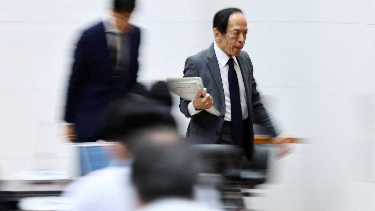 FILE PHOTO: Bank of Japan Governor Kazuo Ueda leaves a press conference after its policy meeting in Tokyo, Japan July 31, 2025. REUTERS/Issei Kato/ File photo