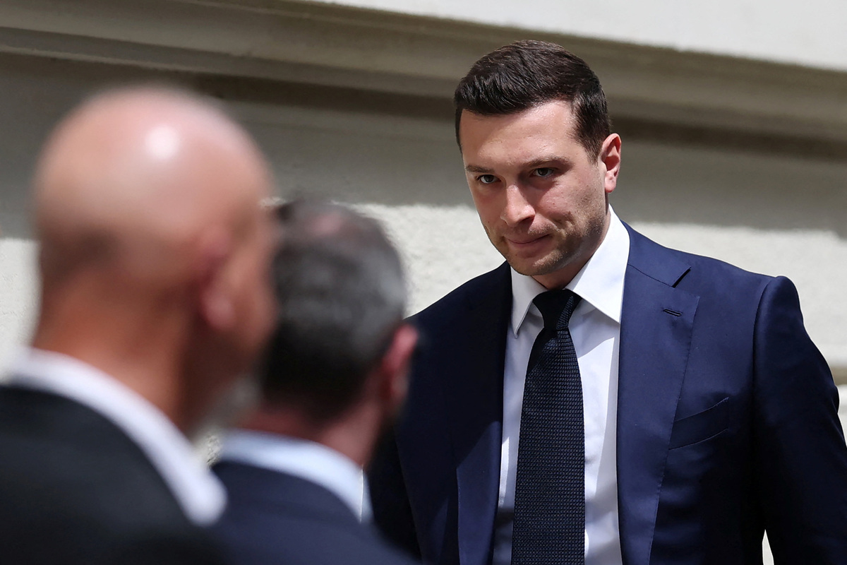 Jordan Bardella, president of the French far-right Rassemblement National (National Rally - RN) political party, arrives at the Rassemblement National headquarters before the verdict in the appeal trial of French far-right leader Marine Le Pen, member of parliament for the Rassemblement National (National Rally - RN) party, alongside the RN party itself and 10 others defendants found guilty of diverting European Parliament funds, in Paris, France, July 7, 2026.  REUTERS/Stephane Mahe