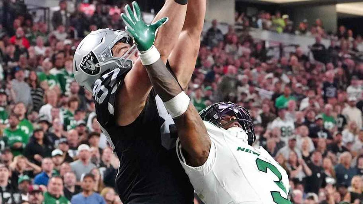 Nov 12, 2023; Paradise, Nevada, USA; Las Vegas Raiders tight end Michael Mayer (87) makes a touchdown reception over the reach of New York Jets safety Jordan Whitehead (3) during the fourth quarter at Allegiant Stadium. Mandatory Credit: Stephen R. Sylvanie-Imagn Images | Stephen R. Sylvanie-Imagn Images 