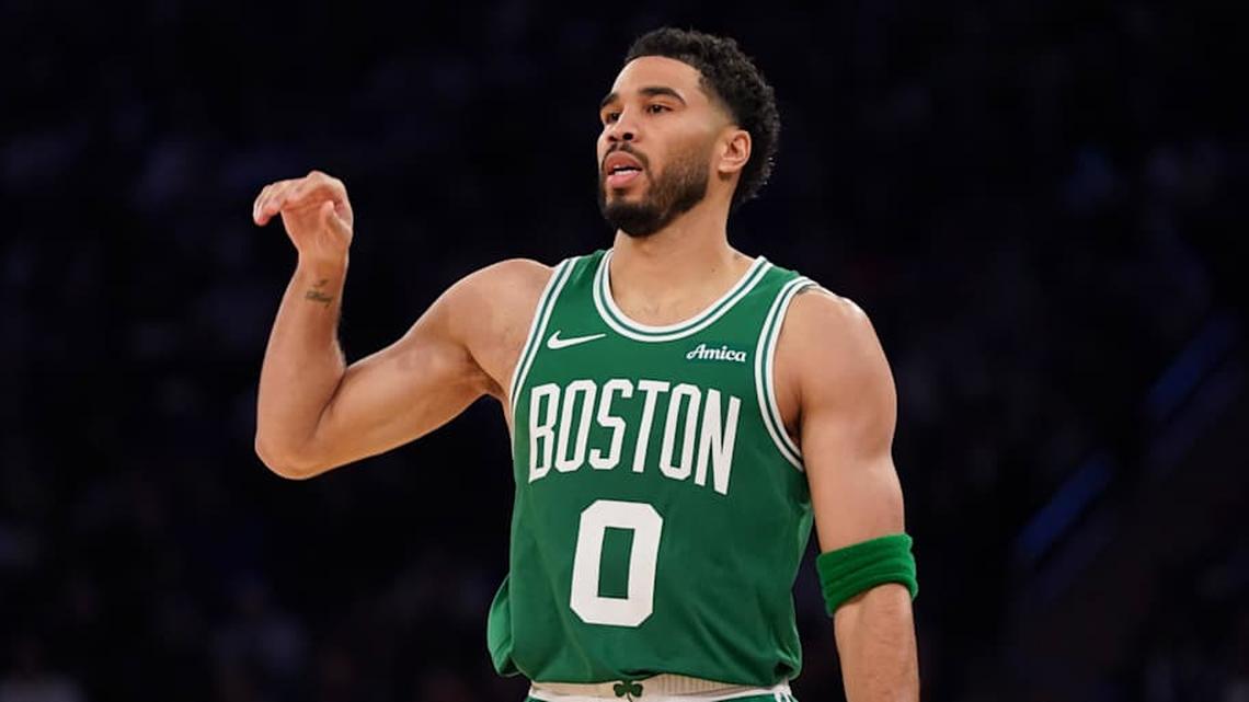  Boston Celtics forward Jayson Tatum reacts after three point attempt against the New York Knicks. | Lucas Boland-Imagn Images 