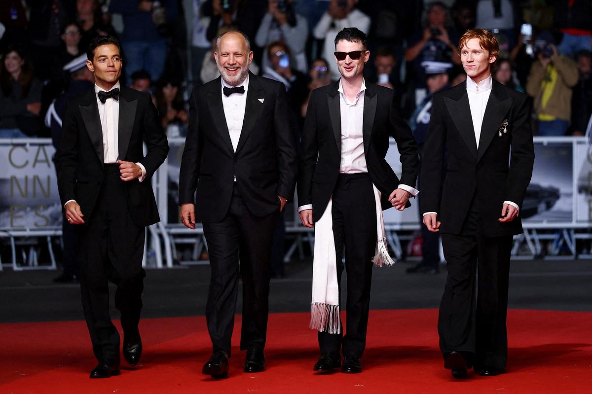 Director Ira Sachs, cast members  Rami Malek, Tom Sturridge and Luther Ford walk on the red carpet during arrivals for the screening of the film "The Man I Love" in competition at the 79th Cannes Film Festival in Cannes, France, May 20, 2026. REUTERS/Gonzalo Fuentes