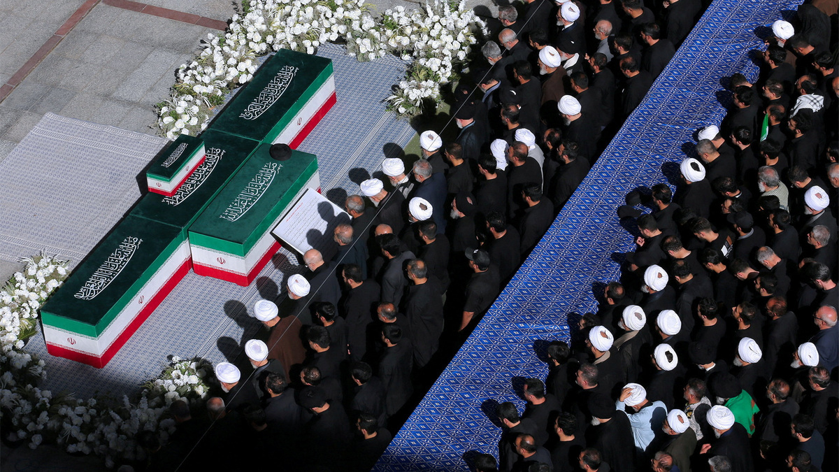 Iranian President Masoud Pezeshkian with officials attend a prayer during a public farewell ceremony to pay their respects to late Supreme Leader Ayatollah Ali Khamenei, who was killed on February 28 in Israeli and U.S. airstrikes, at the Imam Khomeini Grand Mosalla, in Tehran, Iran July 5, 2026. Office of the Iranian Supreme Leader/Handout via REUTERS