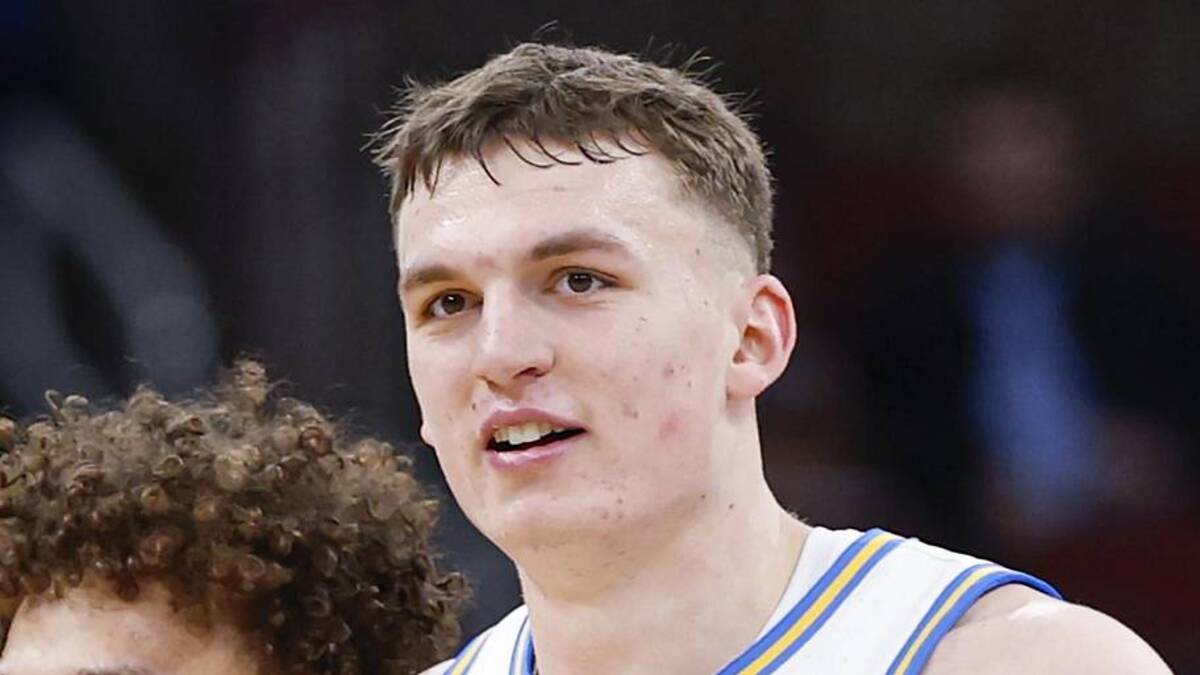 Mar 12, 2026; Chicago, IL, USA; UCLA Bruins guard Trent Perry (0) and forward Tyler Bilodeau (34) smile during the second half at United Center. Mandatory Credit: Kamil Krzaczynski-Imagn Images | Kamil Krzaczynski-Imagn Images 