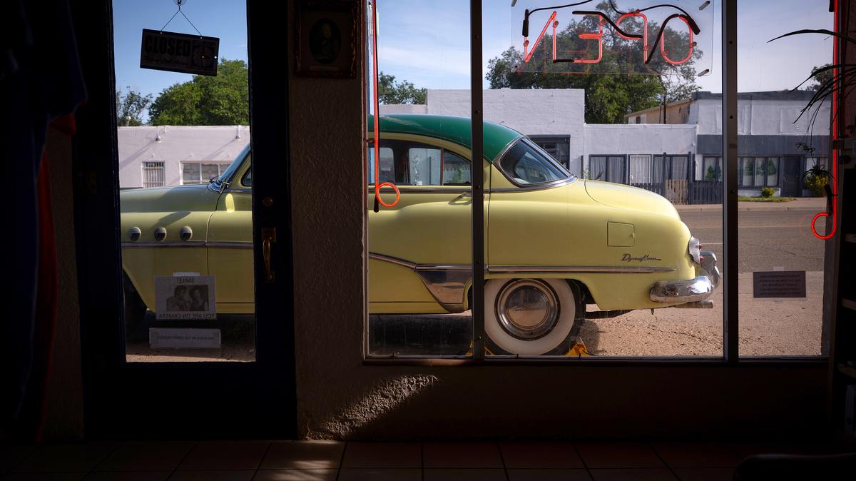 A vintage Buick sits outside the Blue Swallow Motel on Route 66 in Tucumcari, New Mexico, June 11, 2025. (E. Jason Wambsgans/Chicago Tribune)