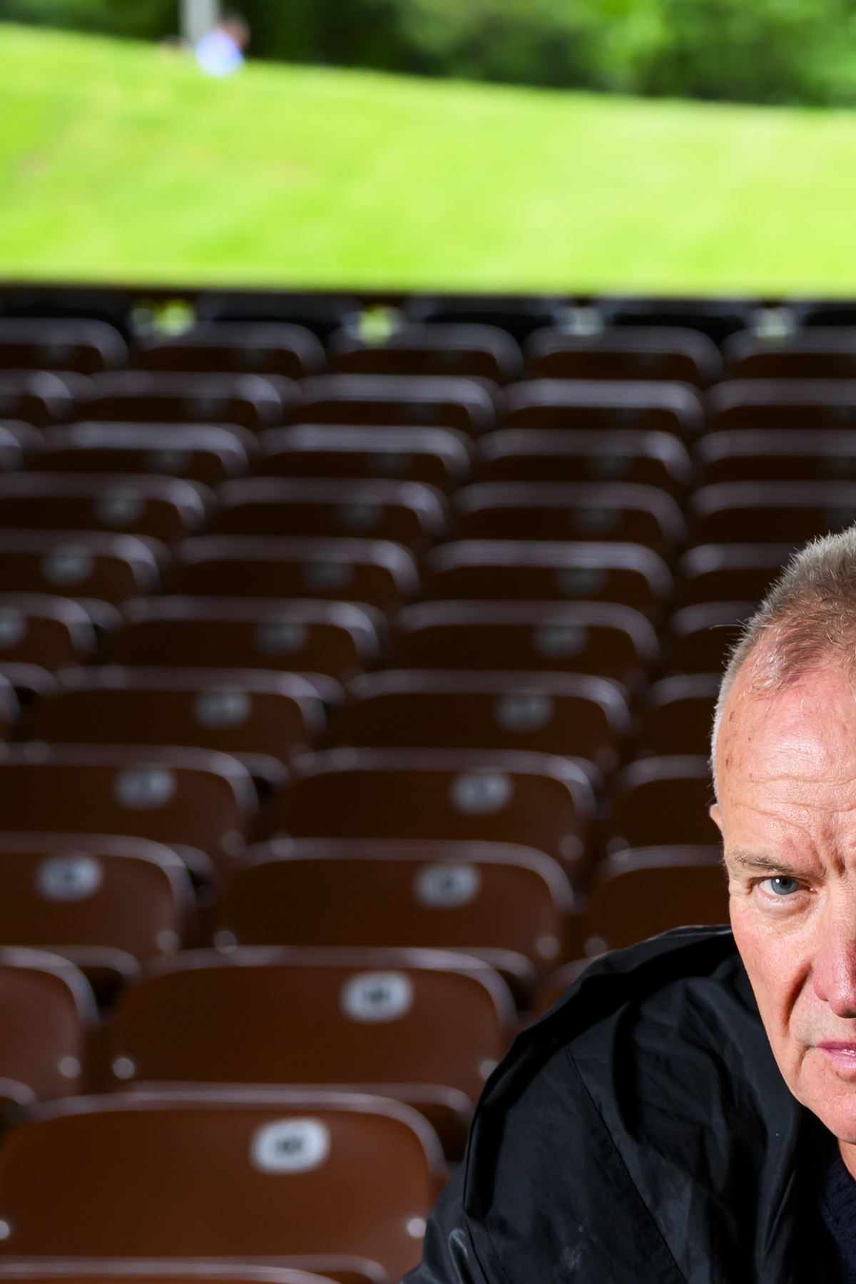 Sting stands among the seats of the Filene Center at Wolf Trap National Park for the Performing Arts in Vienna, Va., May 21, 2026. After his 2014 musical failed on Broadway, Sting is bringing a revised version of it to the Metropolitan Opera for a limited run in June 2026. (Pete Kiehart/The New York Times)
