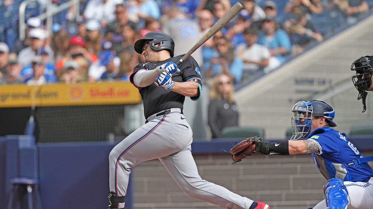 Sep 29, 2024; Toronto, Ontario, CAN; Miami Marlins first baseman Jonah Bride (41) hits a two run single against the Toronto Blue Jays during the first inning at Rogers Centre. Mandatory Credit: Nick Turchiaro-Imagn Images