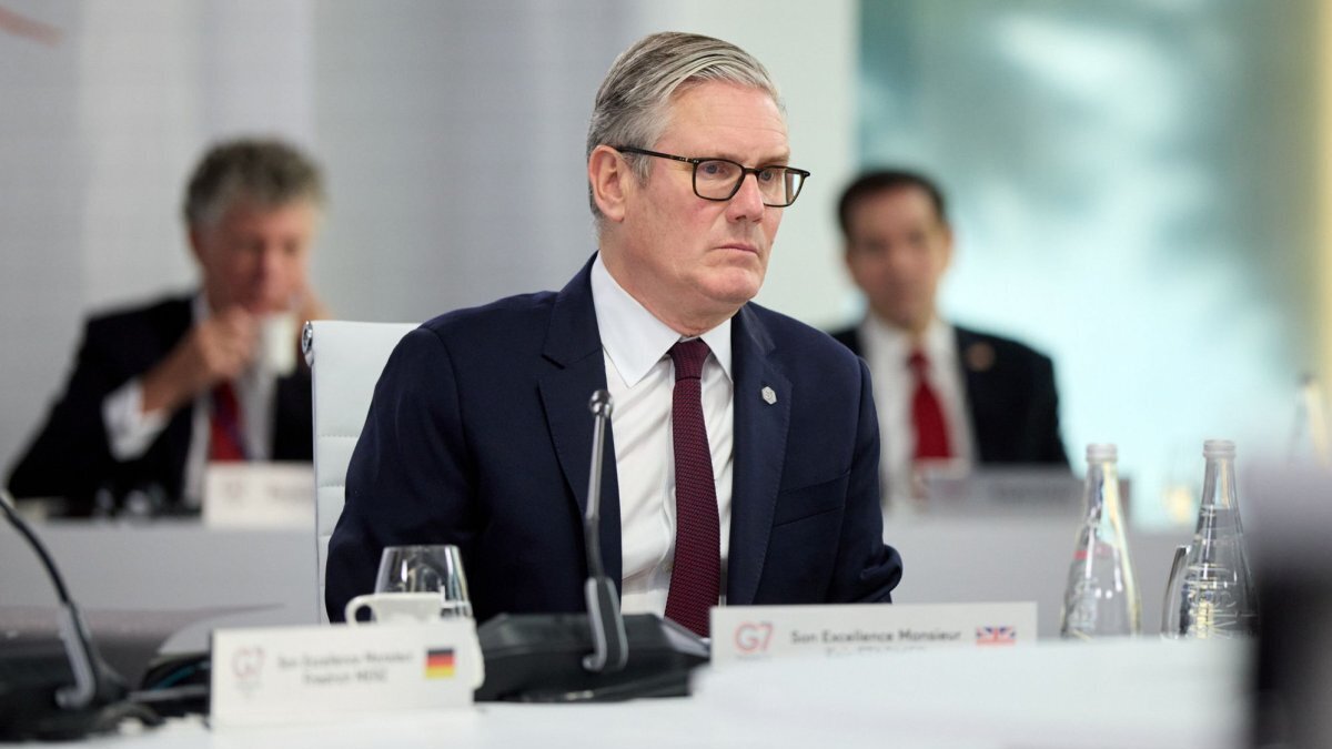 British Prime Minister Kier Starmer participates in a round table discussion at the G7 Summit in Evian, France, on Tuesday.Two men were sentenced Friday in arson attacks on properties that were formerly linked to the prime minister. Photo via Ukrainian Presidential Press Office/UPI