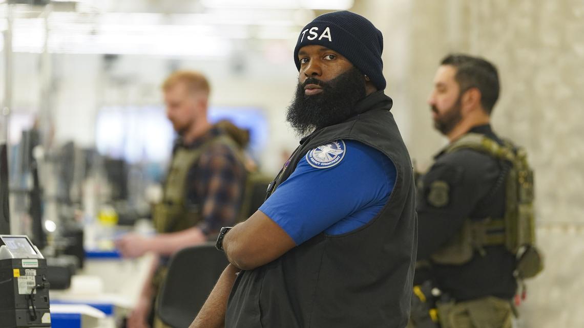 Lines persist at some airports after Trump signs TSA pay memo