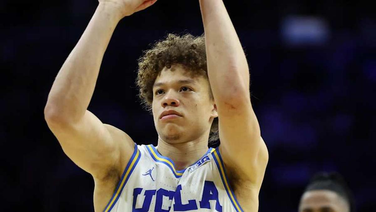  Mar 20, 2026; Philadelphia, PA, USA; UCLA Bruins guard Trent Perry (0) shoots the ball in the second half during a first round game of the men's 2026 NCAA Tournament at Xfinity Mobile Arena. Mandatory Credit: Bill Streicher-Imagn Images | Bill Streicher-Imagn Images 