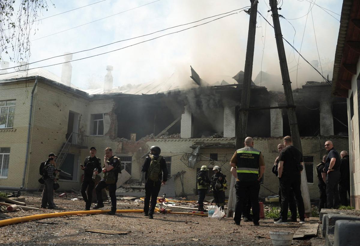 Rescuers work at the site of the kindergarten hit by a Russian drone strike, amid Russia's attack on Ukraine, in Sumy, Ukraine May 6, 2026.  REUTERS/Stringer