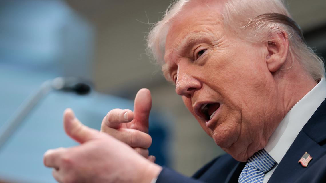 President Donald Trump mimics firing a gun as he speaks about the conflict in Iran in the James S. Brady Press Briefing Room of the White House on April 6, 2026, in Washington, D.C. (Kent Nishimura/AFP/Getty Images/TNS)