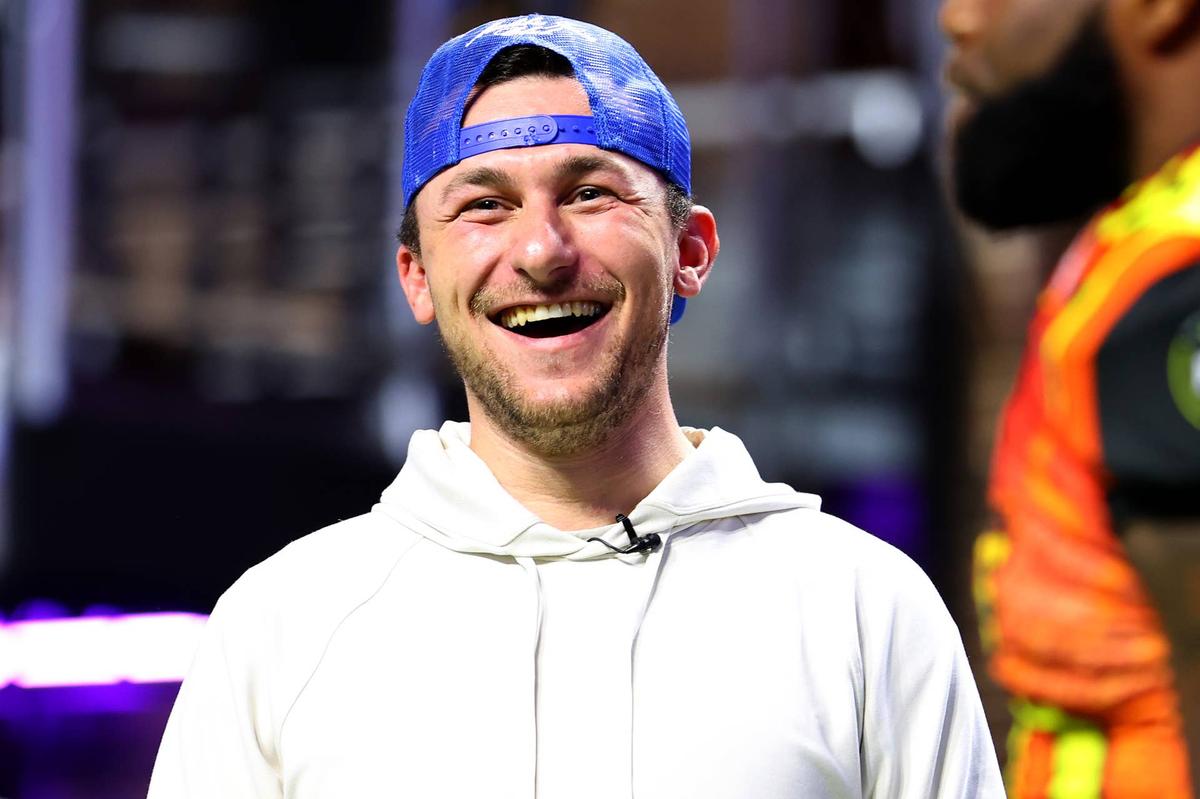  ATLANTA, GEORGIA - MAY 28: Johnny Manziel laughs on the field during Fan Controlled Football Season v2.0 - Week Seven on May 28, 2022 in Atlanta, Georgia. (Photo by Casey Sykes/Fan Controlled Football/Getty Images) 
