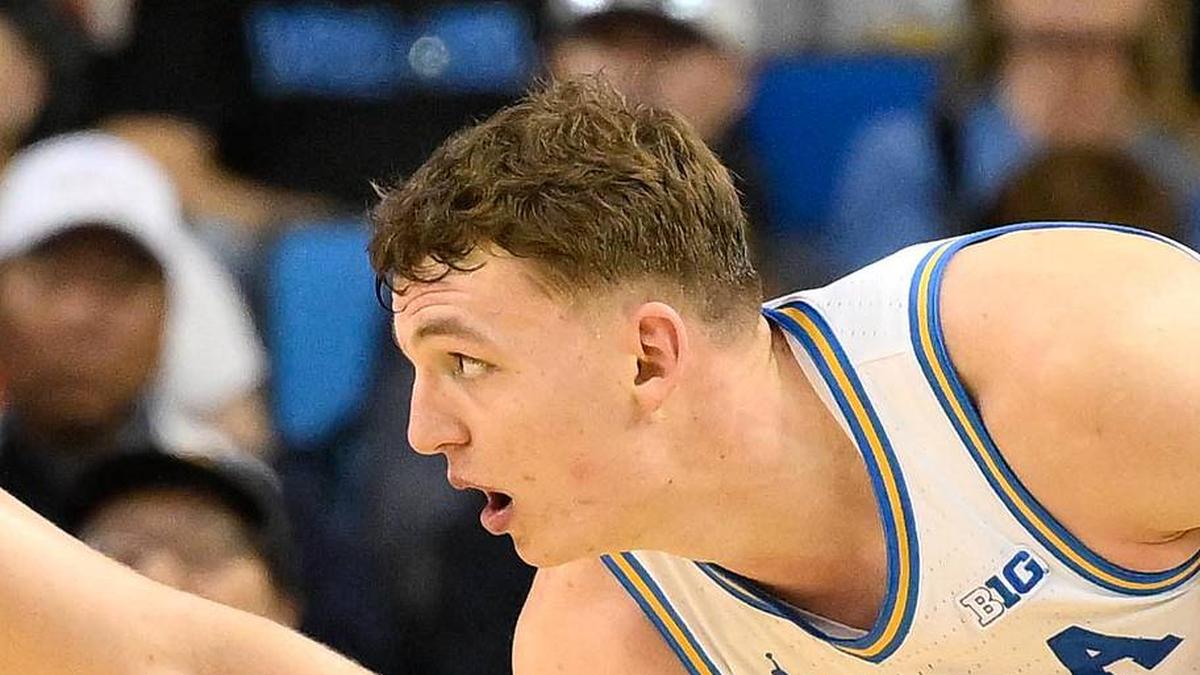  Feb 21, 2026; Los Angeles, California, USA; UCLA forward Tyler Bilodeau (34) and Illinois center Tomislav Ivisic (13) during the 2nd half at Pauley Pavilion presented by Wescom Financial. Mandatory Credit: Robert Hanashiro-Imagn Images | Robert Hanashiro-Imagn Images 