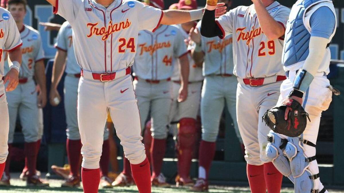  Jun 5, 2026; Chapel Hill, NC, USA; USC infielder Dean Carpentier (6) and teammates celebrate his grand slam against the North Carolina Tar Heels in the sixth inning at Boshamer Stadium. Mandatory Credit: Zachary Taft-Imagn Images | Zachary Taft-Imagn Images 
