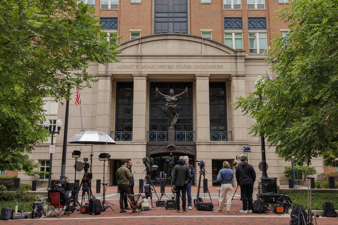 Reporters gather outside of the Albert V. Bryan U.S. Courthouse, where James Comey was to surrender himself, in Alexandria, Va., on Wednesday, April 29, 2026. Comey, the former FBI director, made his first court appearance on Wednesday after being charged over a photograph of seashells he had posted on social media that the Justice Department branded a serious threat to President Trump. (Jason Andrew/The New York Times)