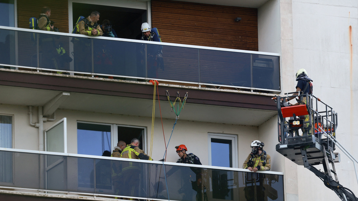 At least 6 people killed in fire in Antwerp apartment tower, Belgian police say 