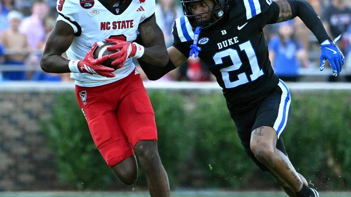  North Carolina State Wolfpack wide receiver Terrell Anderson (9) runs the ball during the second quarter against Duke Blue Devils cornerback Landan Callahan (21) at Wallace Wade Stadium. | Zachary Taft-Imagn Images 