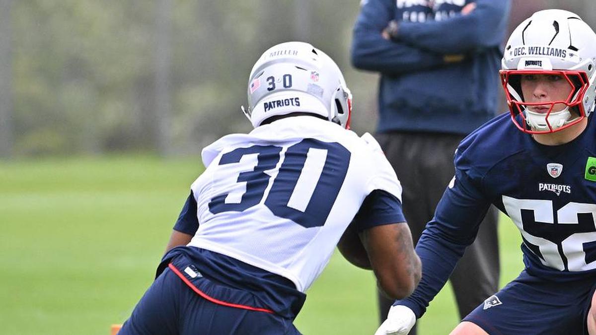  May 9, 2026; Foxborough, MA, USA; New England Patriots linebacker Declan Williams (52) works on a drill with running back Jam Miller (30) during the New England Patriots rookie camp at Gillette Stadium. Mandatory Credit: Eric Canha-Imagn Images | Eric Canha-Imagn Images 