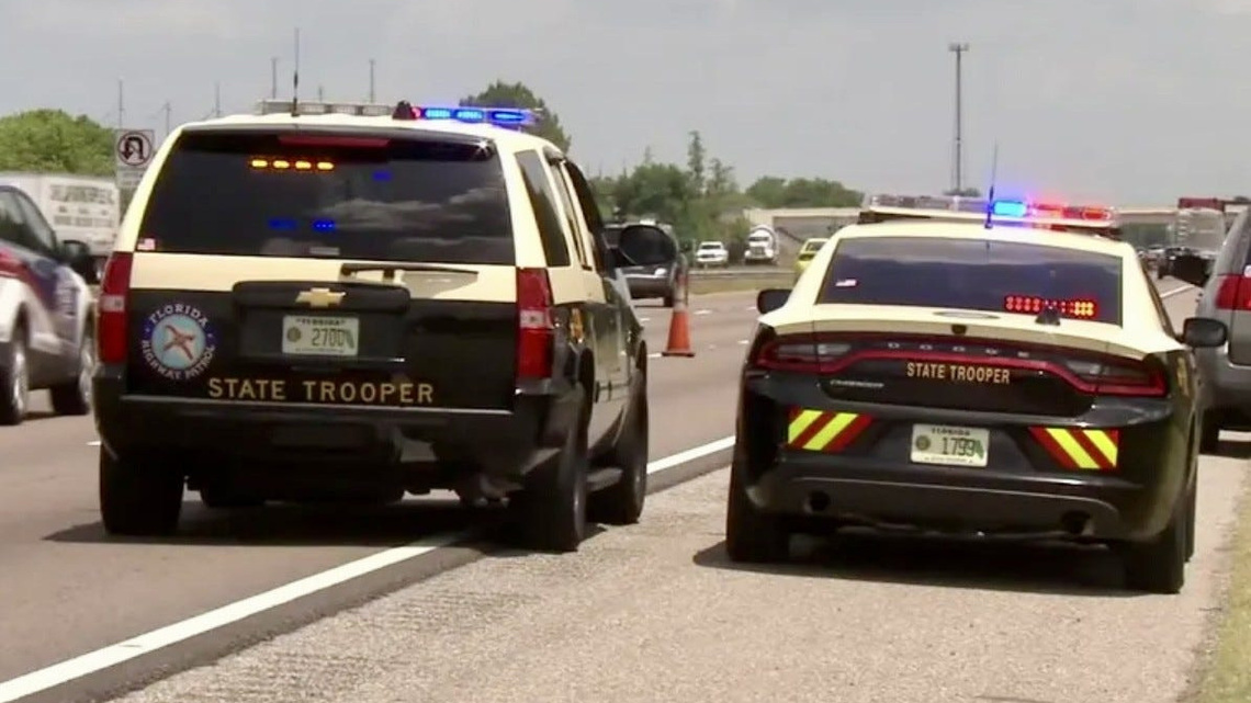 Pedestrian killed in 2-car crash crossing against signal in DeLand | FHP 