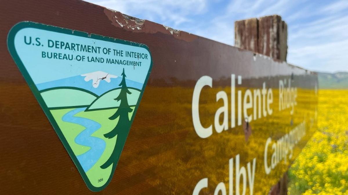 FILE PHOTO: The logo of the U.S. Bureau of Land Management, an arm of the Department of Interior, is seen on a sign in the Carrizo Plain National Monument, California, U.S., April 16, 2023. REUTERS/Nichola Groom/File Photo