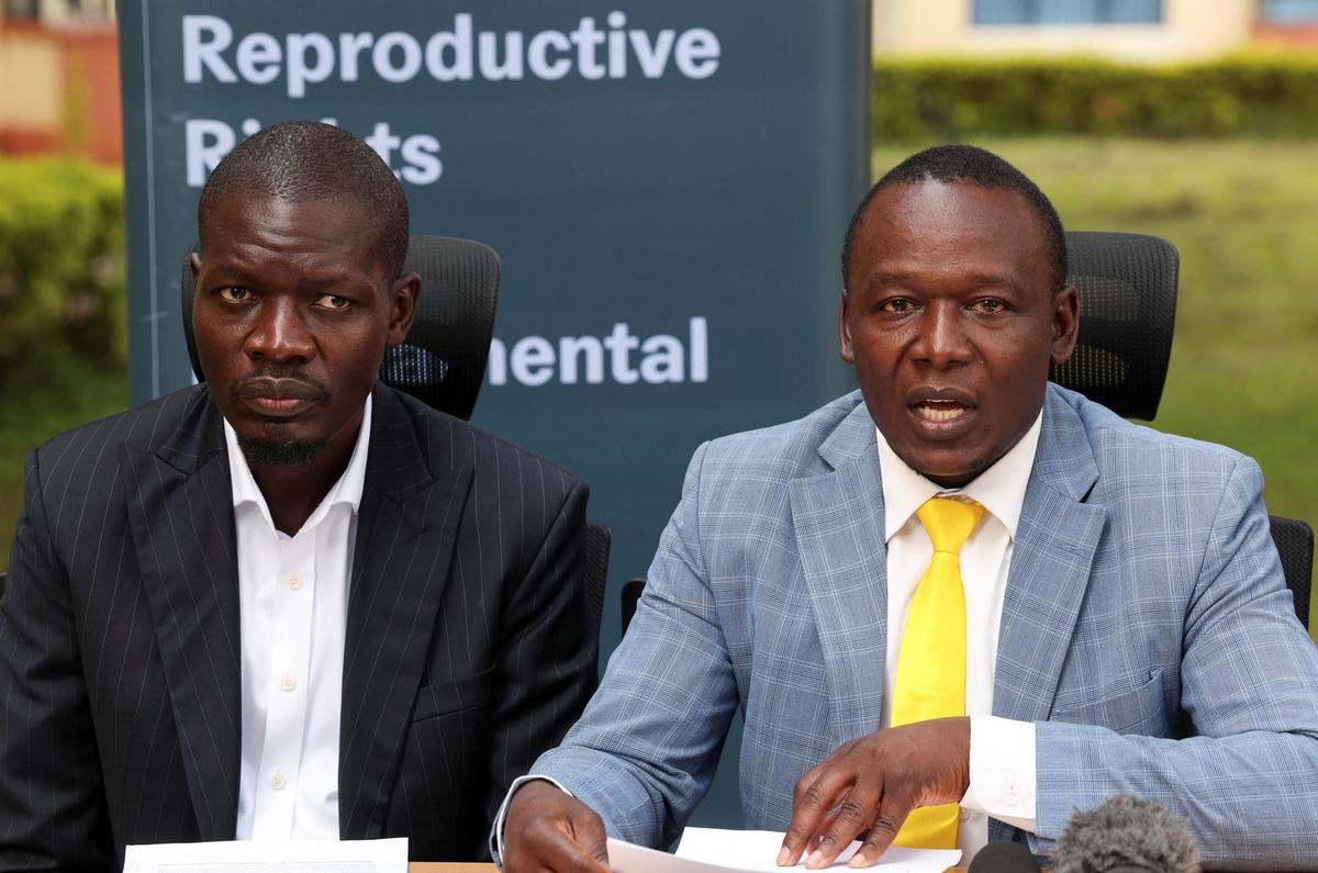 Director at the Network for Adolescent and Youth of Africa Victor Rasugu and Martin Onyango, Associate Director for Africa Legal Strategies of the Center for Reproductive Rights, attend a press conference after the high court ruled that sections of a law targeting sexual offences cannot apply to minors found to have had consensual intercourse in Nairobi, Kenya, May 20, 2026. REUTERS/Monicah Mwangi