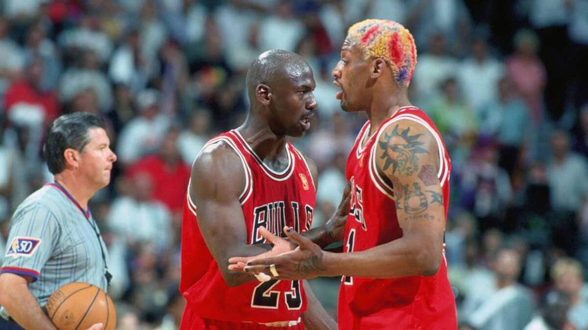  Unknown Date 1997; Miami, FL, USA; FILE PHOTO; Chicago Bulls forward #91 DENNIS RODMAN is held back from the official by guard #23 MICHAEL JORDAN against the Miami Heat at the Miami Arena during the 1996-97 season. Mandatory Credit: Photo By USA TODAY Sports (c) Copyright USA TODAY Sports | IMAGN IMAGES via Reuters Connect 