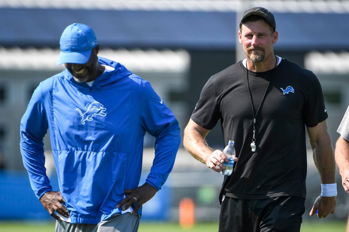  ALLEN PARK, MICHIGAN - JULY 28: Detroit Lions general manager Brad Holmes (L) and head football coach Dan Campbell talk after the Detroit Lions Training Camp on July 28, 2021 in Allen Park, Michigan. (Photo by Nic Antaya/Getty Images) 