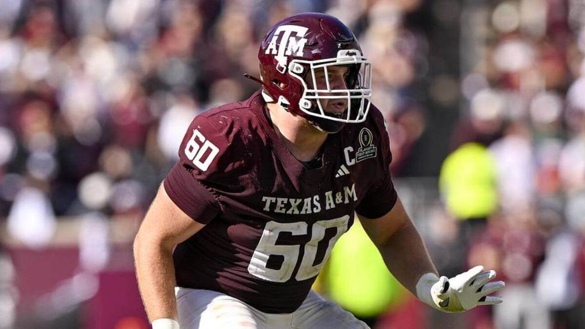  Dec 20, 2025; College Station, TX, USA; Texas A&M Aggies offensive lineman Trey Zuhn III (60) blocks the rush during the game between the Aggies and the Hurricanes at Kyle Field. Mandatory Credit: Jerome Miron-Imagn Images | Jerome Miron-Imagn Images 