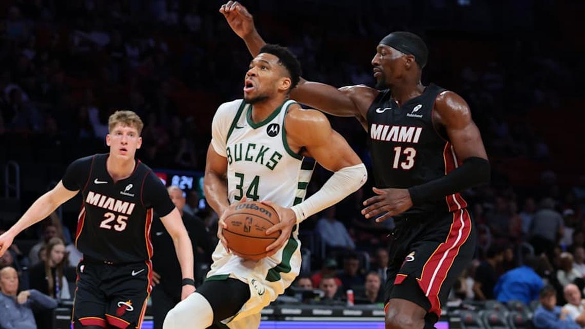  Mar 12, 2026; Miami, Florida, USA; Milwaukee Bucks forward Giannis Antetokounmpo (34) drives to the basket against Miami Heat center Bam Adebayo (13) during the first quarter at Kaseya Center. Mandatory Credit: Sam Navarro-Imagn Images | Sam Navarro-Imagn Images 