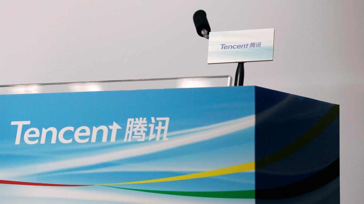 Logos of Tencent are displayed at a news conference in Hong Kong, China March 22, 2017. REUTERS/Tyrone Siu