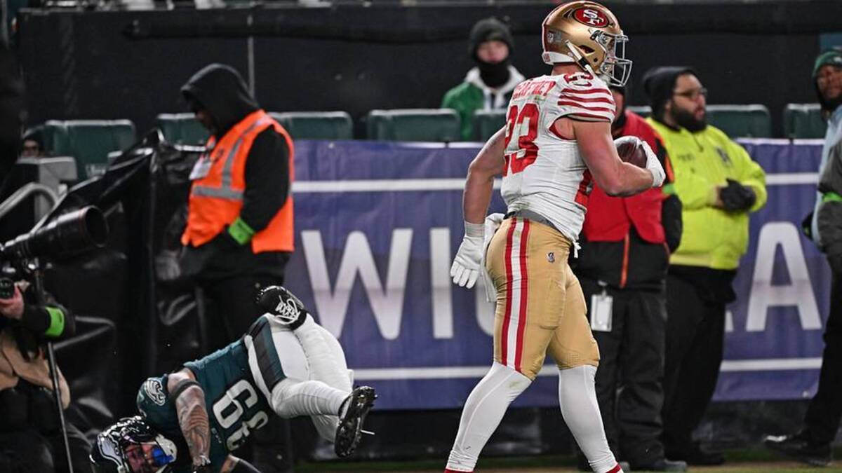  Jan 11, 2026; Philadelphia, PA, USA; San Francisco 49ers running back Christian McCaffrey (23) scores a touchdown against Philadelphia Eagles safety Marcus Epps (39) during the fourth quarter in an NFC Wild Card Round game at Lincoln Financial Field. Mandatory Credit: Eric Hartline-Imagn Images | Eric Hartline-Imagn Images 
