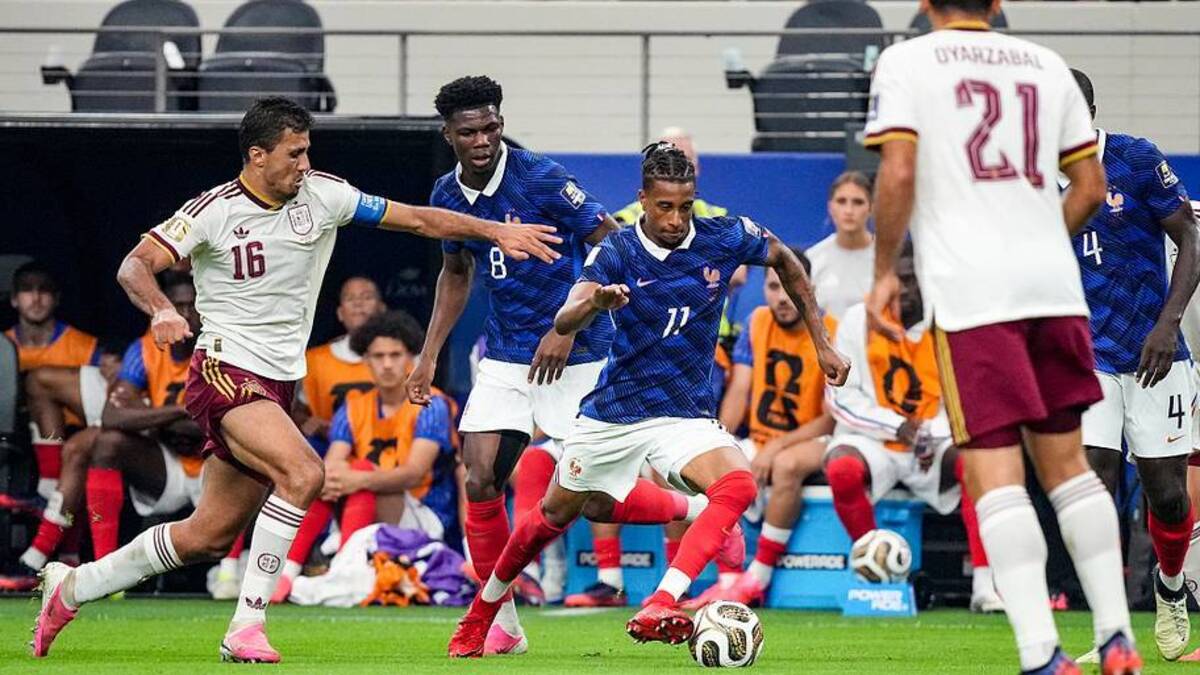  Michael Olise (center) got nothing going against Rodri. | Erick W. Rasco/Sports Illustrated 