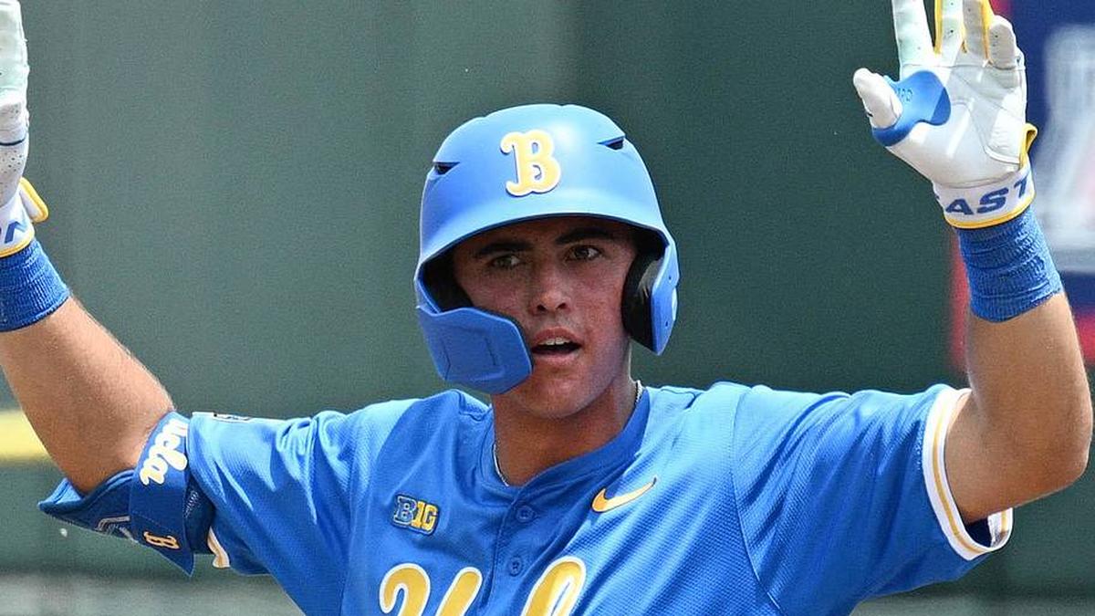  Jun 14, 2025; Omaha, Neb, USA; UCLA Bruins catcher Cashel Dugger (40) signals after hitting a double against the Murray State Racers during the second inning at Charles Schwab Field. Mandatory Credit: Steven Branscombe-Imagn Images | Steven Branscombe-Imagn Images 