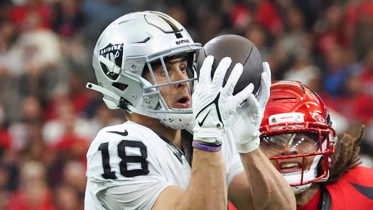  Dec 21, 2025; Houston, Texas, USA; Las Vegas Raiders wide receiver Jack Bech (18) makes a reception as Houston Texans cornerback Derek Stingley Jr. (24) defends during the first half at NRG Stadium. Mandatory Credit: Troy Taormina-Imagn Images | IMAGN IMAGES via Reuters Connect 