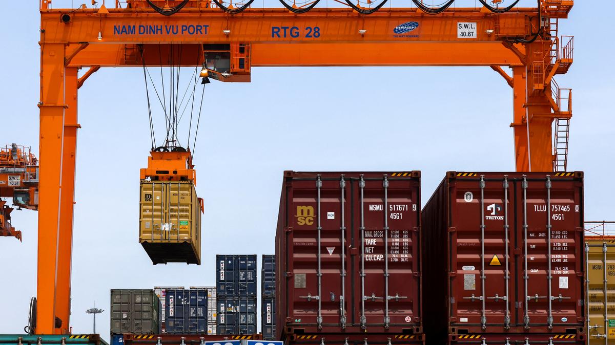 A container is loaded onto a cargo ship while docked at Hai Phong port in Hai Phong, Vietnam, April 16, 2025. REUTERS/Athit Perawongmetha